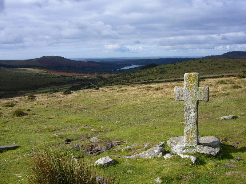 Stone cross on a hillside