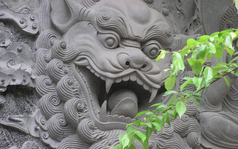 Stone Dragon Carving — Gray, Dramatic, Spring