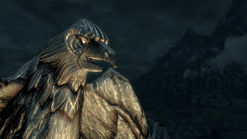 stone eagle statue at night