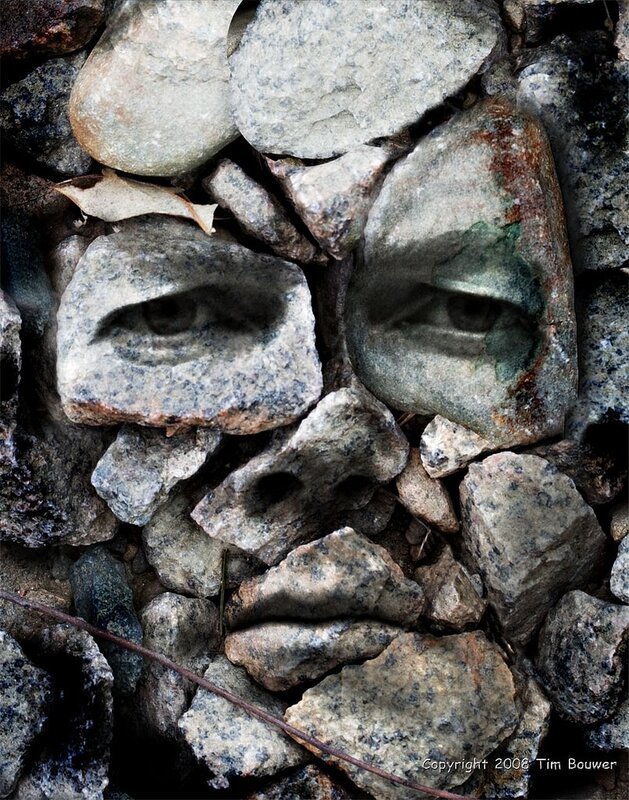 stone face in rocks