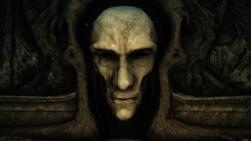Stone Face Sculpture — Gray