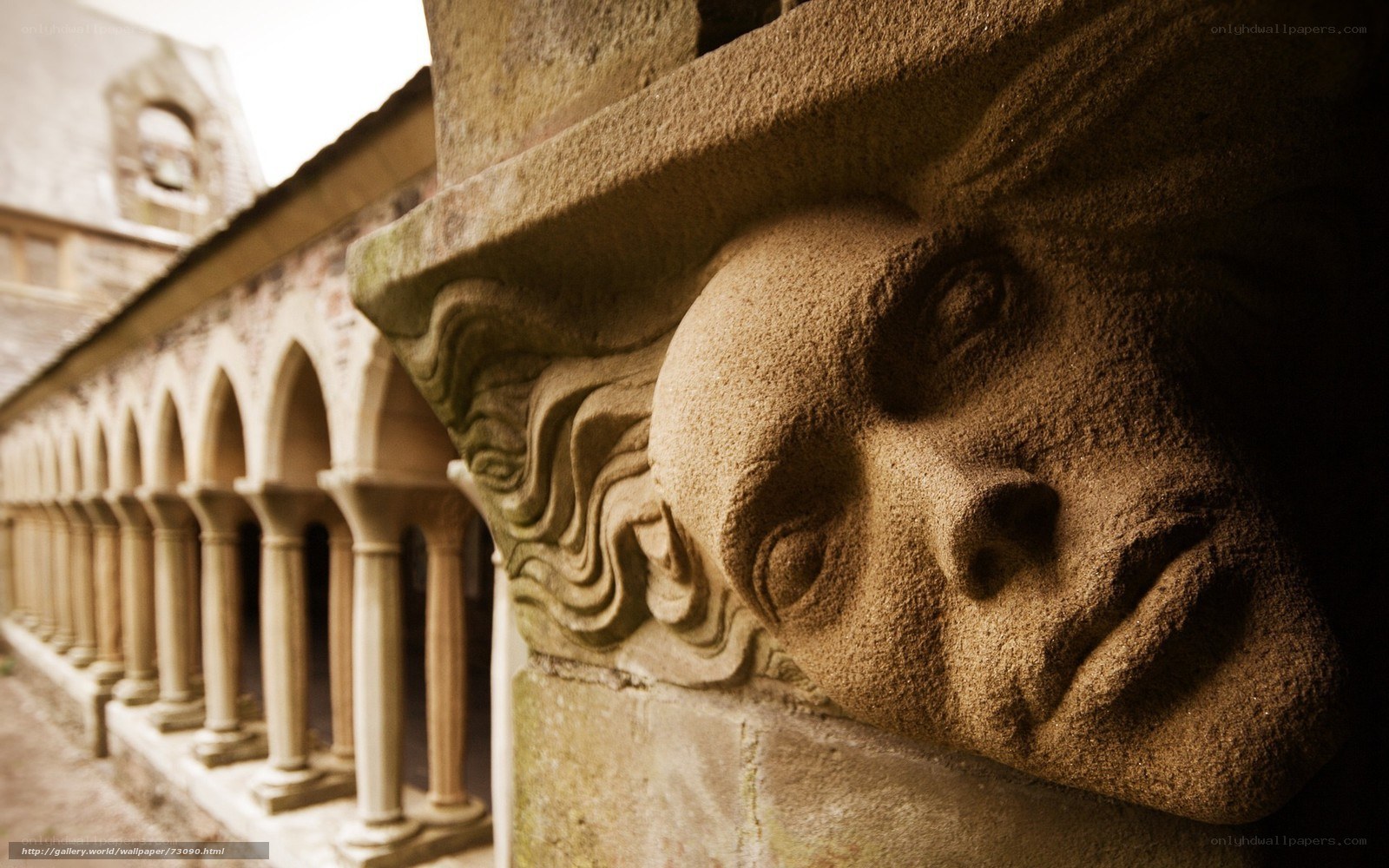 Stone face sculpture in cloister