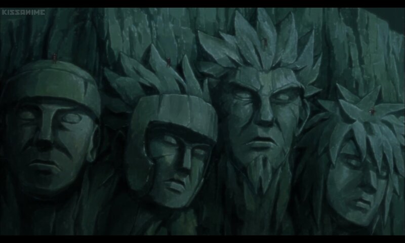 Stone Faces Carved into Cliff