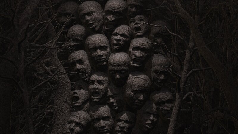 Stone Faces in Forest