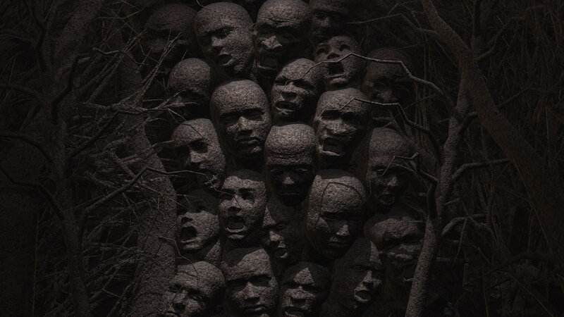 Stone Faces in Tree