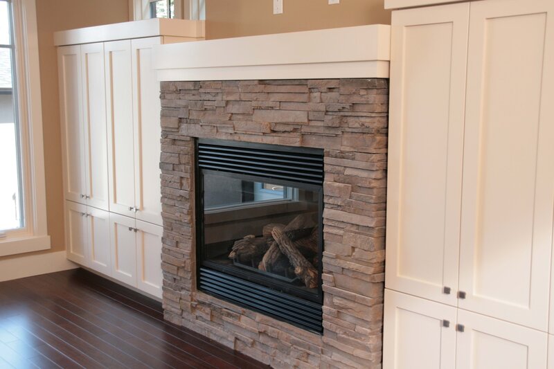 Stone Fireplace with Cabinets
