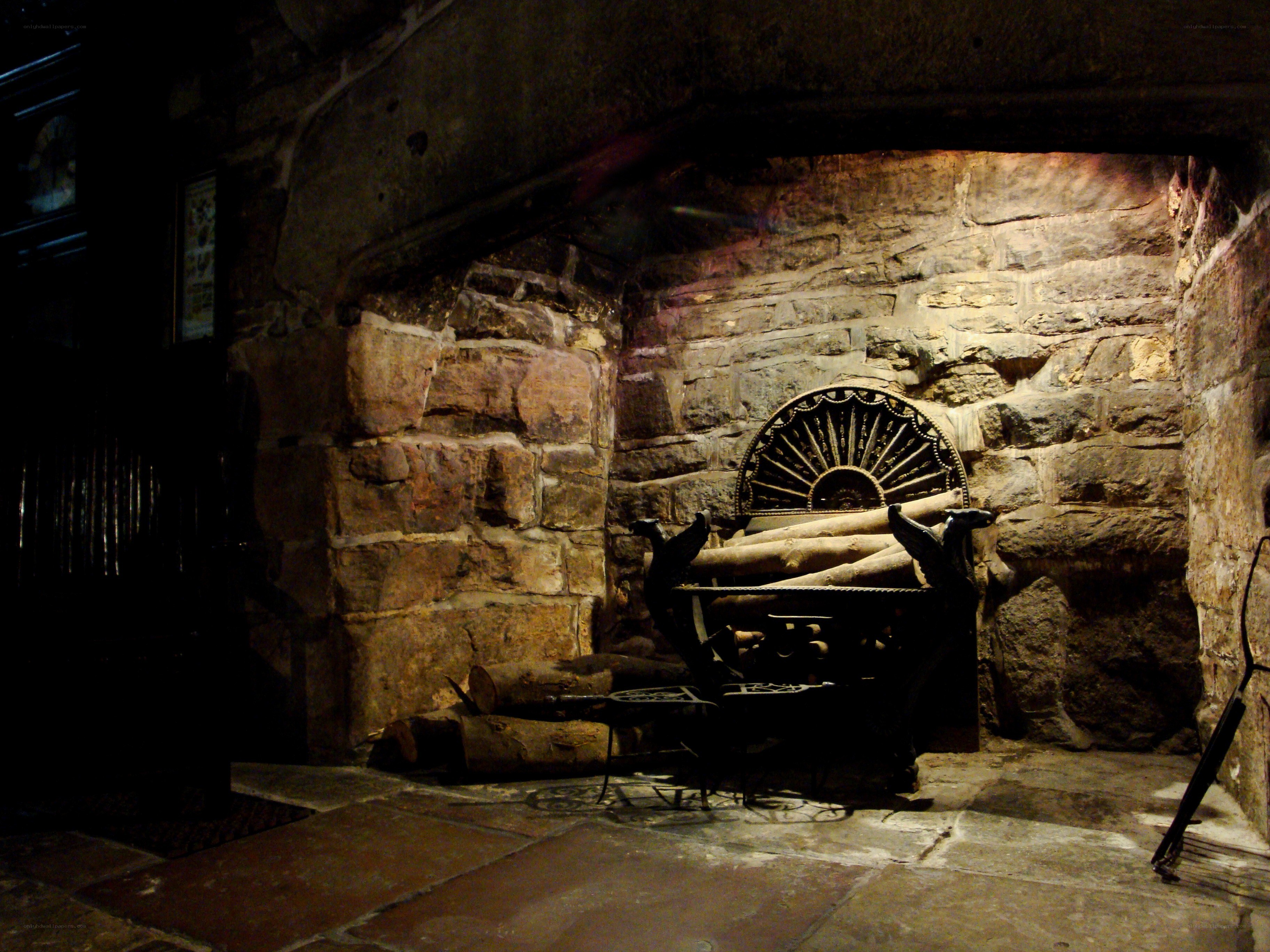 Stone fireplace with firewood