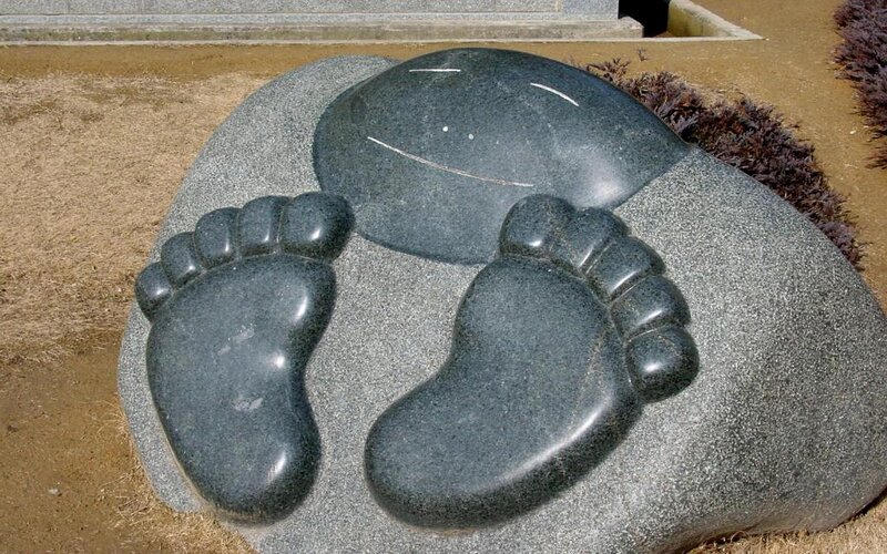 stone footprints sculpture