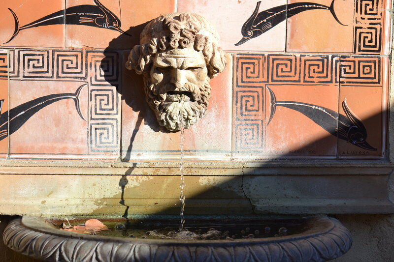 Stone Fountain with Face