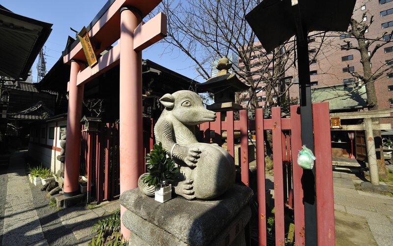Stone fox statue at a Japanese shrine