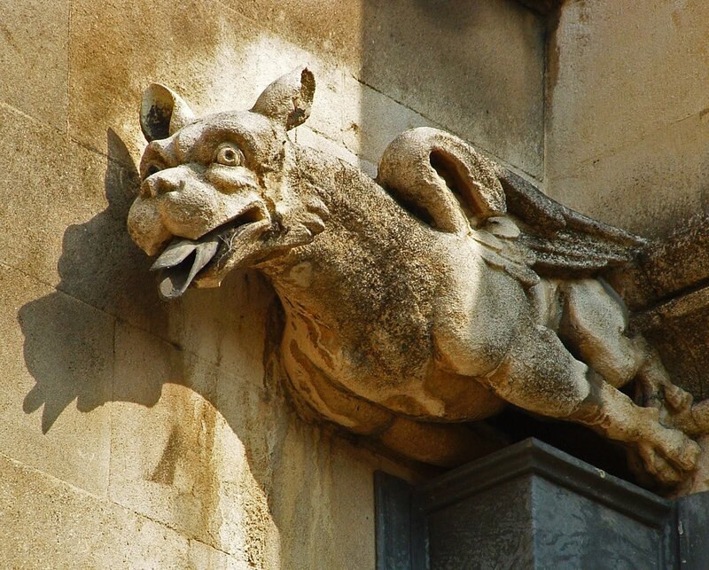 Stone gargoyle on building