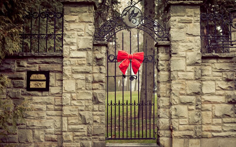 Stone gate with red bow