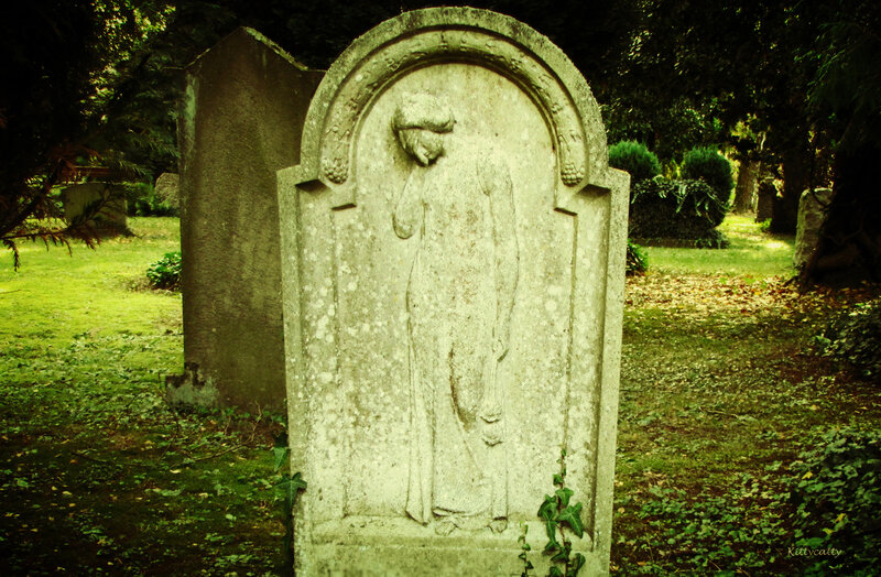 Stone Gravestone with Carving