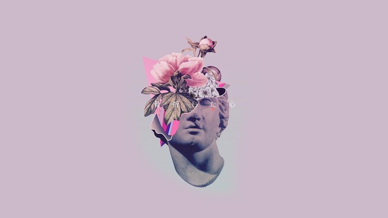 Stone Head with Flowers