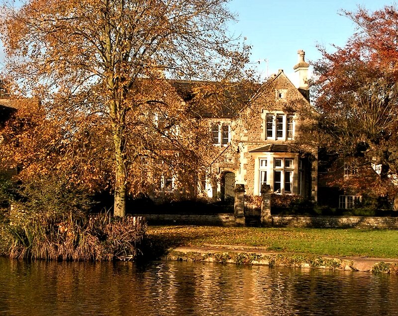 Stone House by River — Brown
