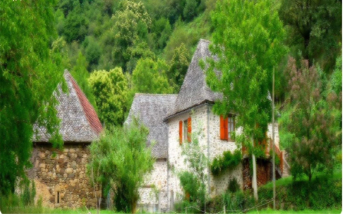 Stone house in a green valley