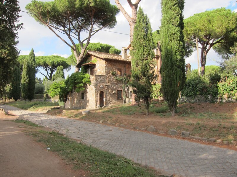 Stone House with Cypress Trees