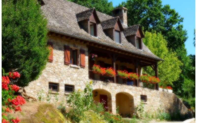 Stone house with flower boxes