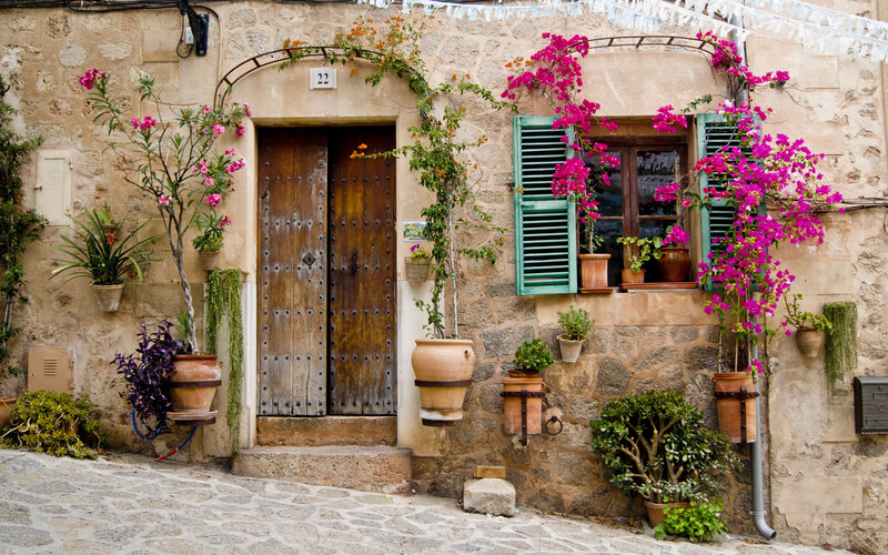 Stone House with Flowers — Brown, Serene