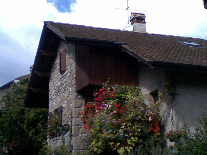 stone house with flowers