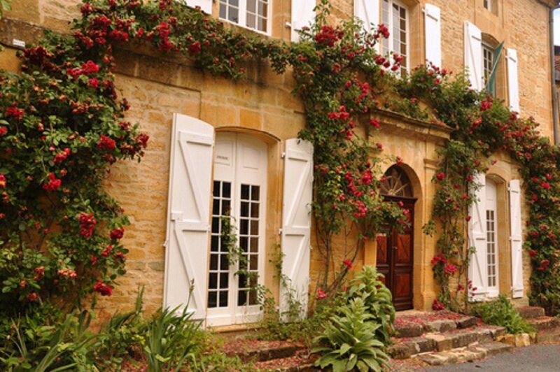 Stone House with Roses