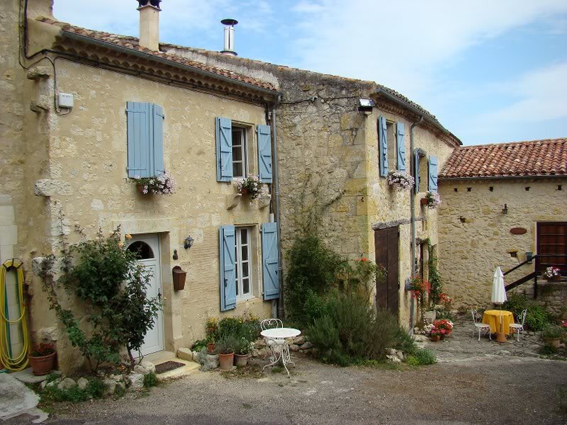 Stone House with Shutters