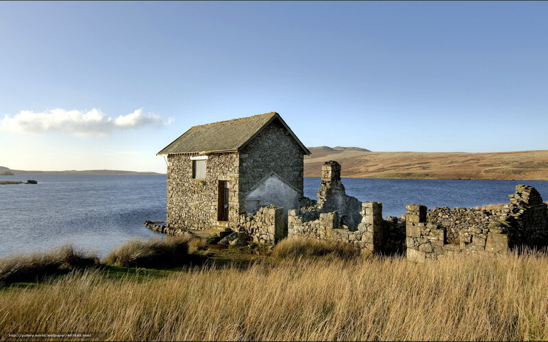 Stone hut by a lake