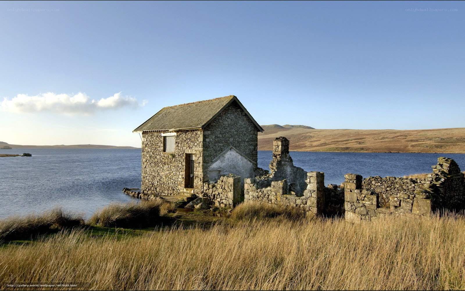 Stone hut by a lake