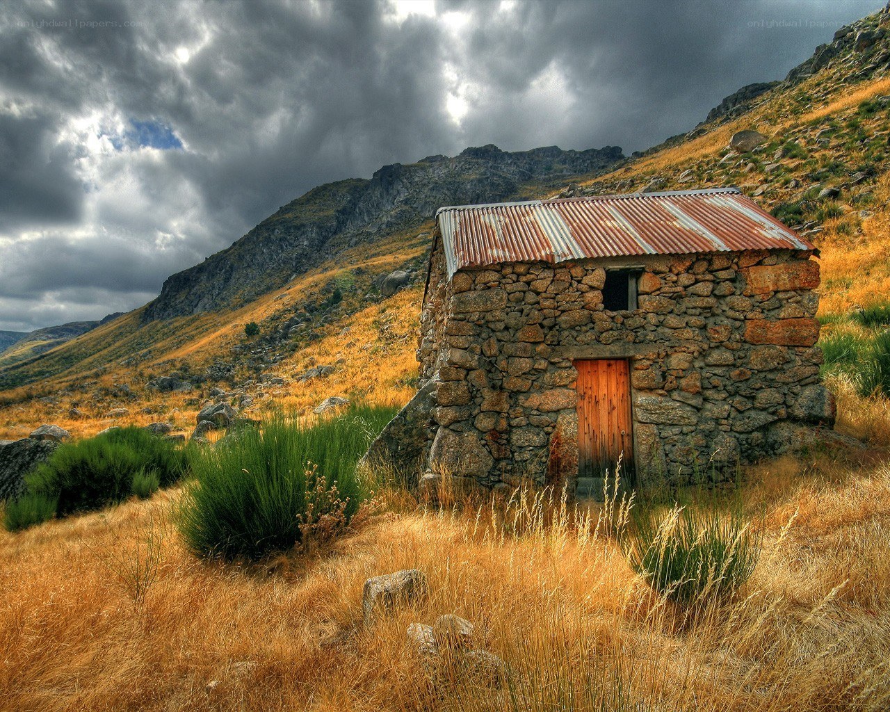 Stone hut in mountain landscape