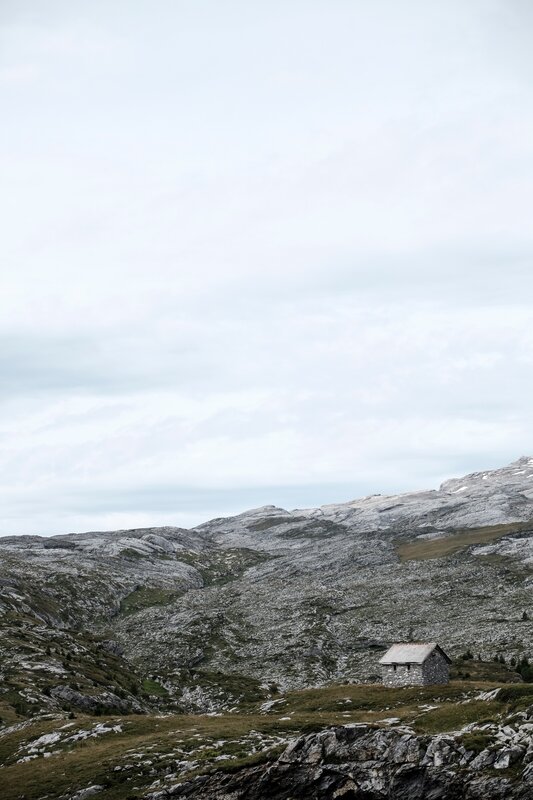 Stone Hut in Mountains — Gray