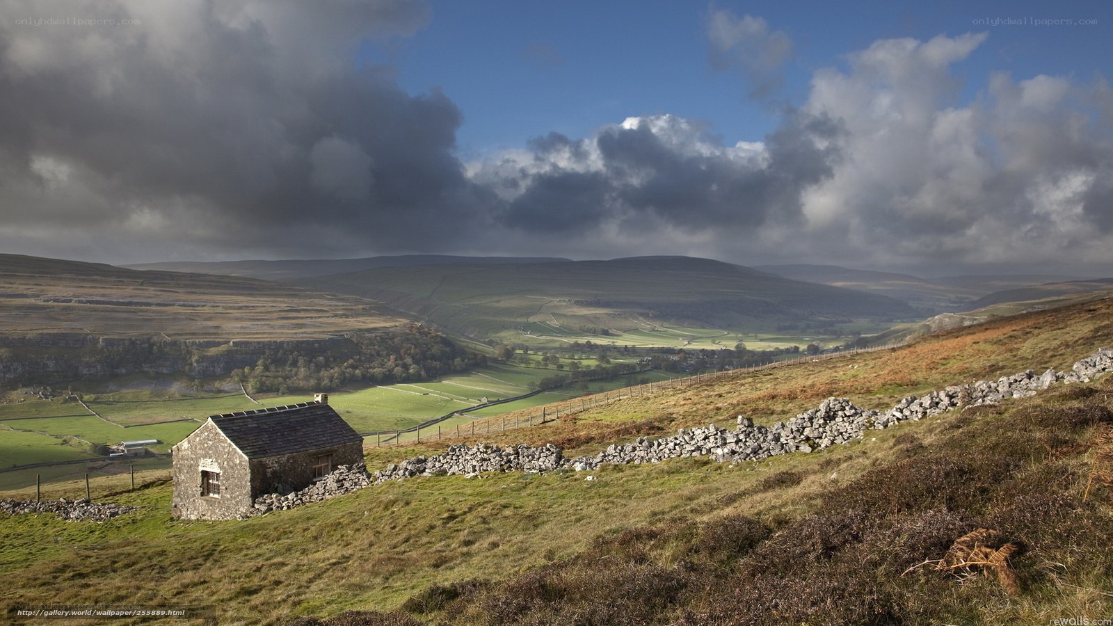Stone hut in rolling hills