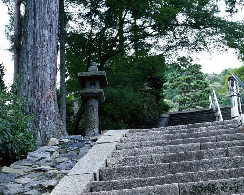 Stone lantern by stone stairs