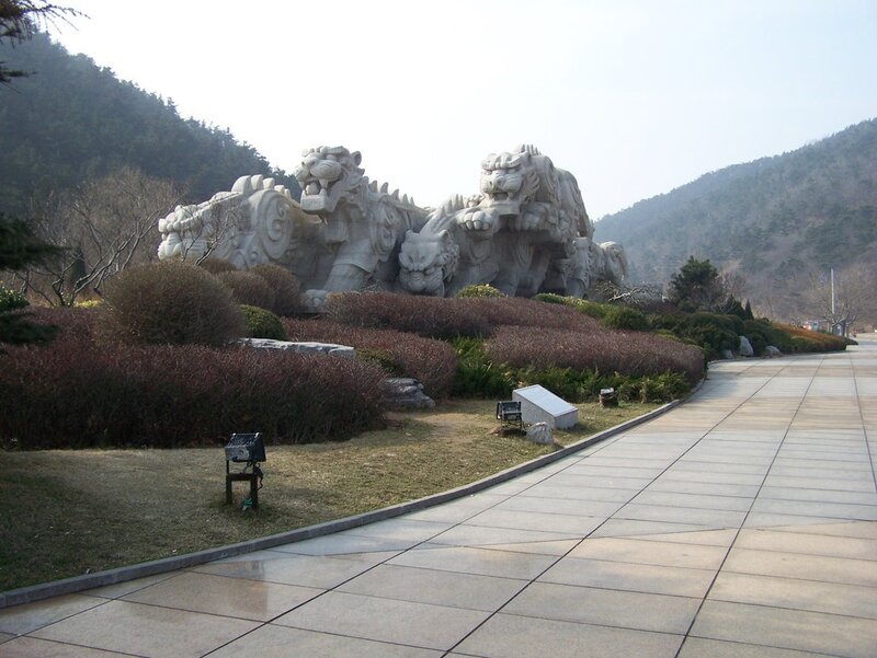 Stone lion sculptures in a park