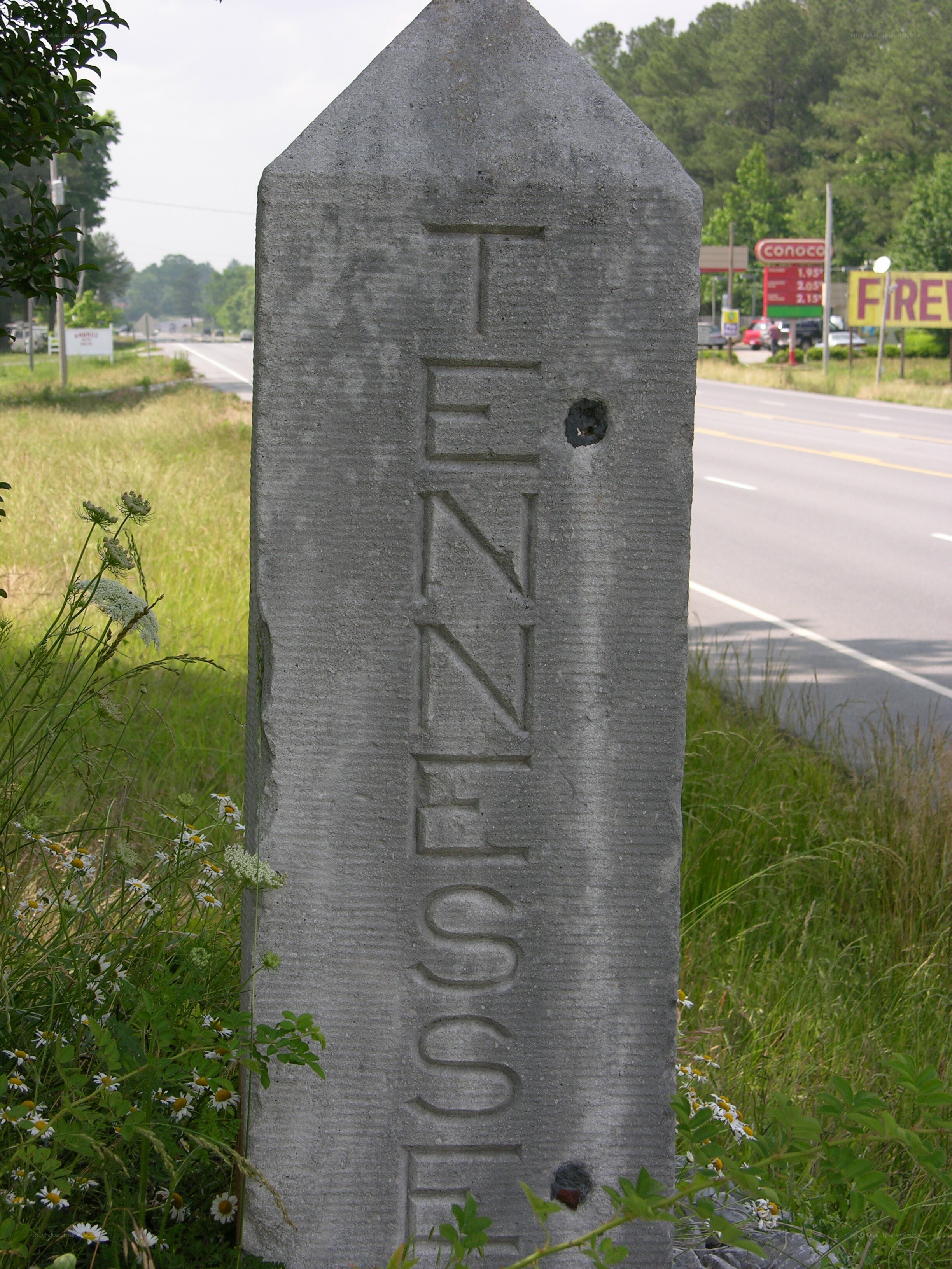 stone marker on roadside
