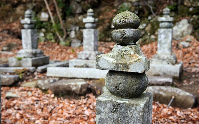 Stone markers in a forest