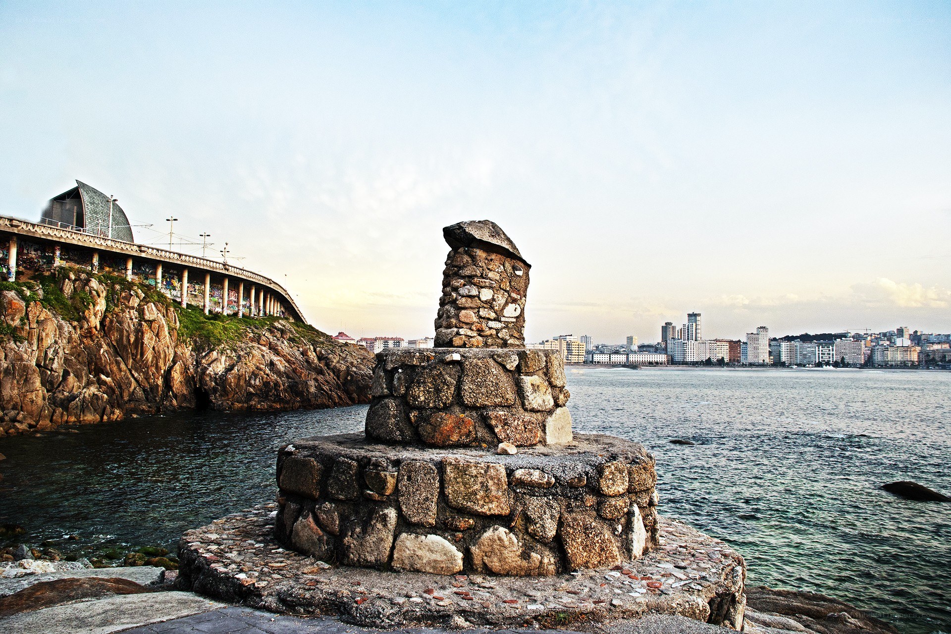 Stone monument by the sea