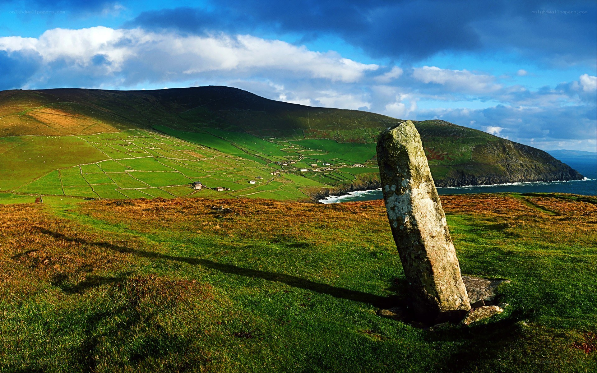 Stone monument on a coastal hill
