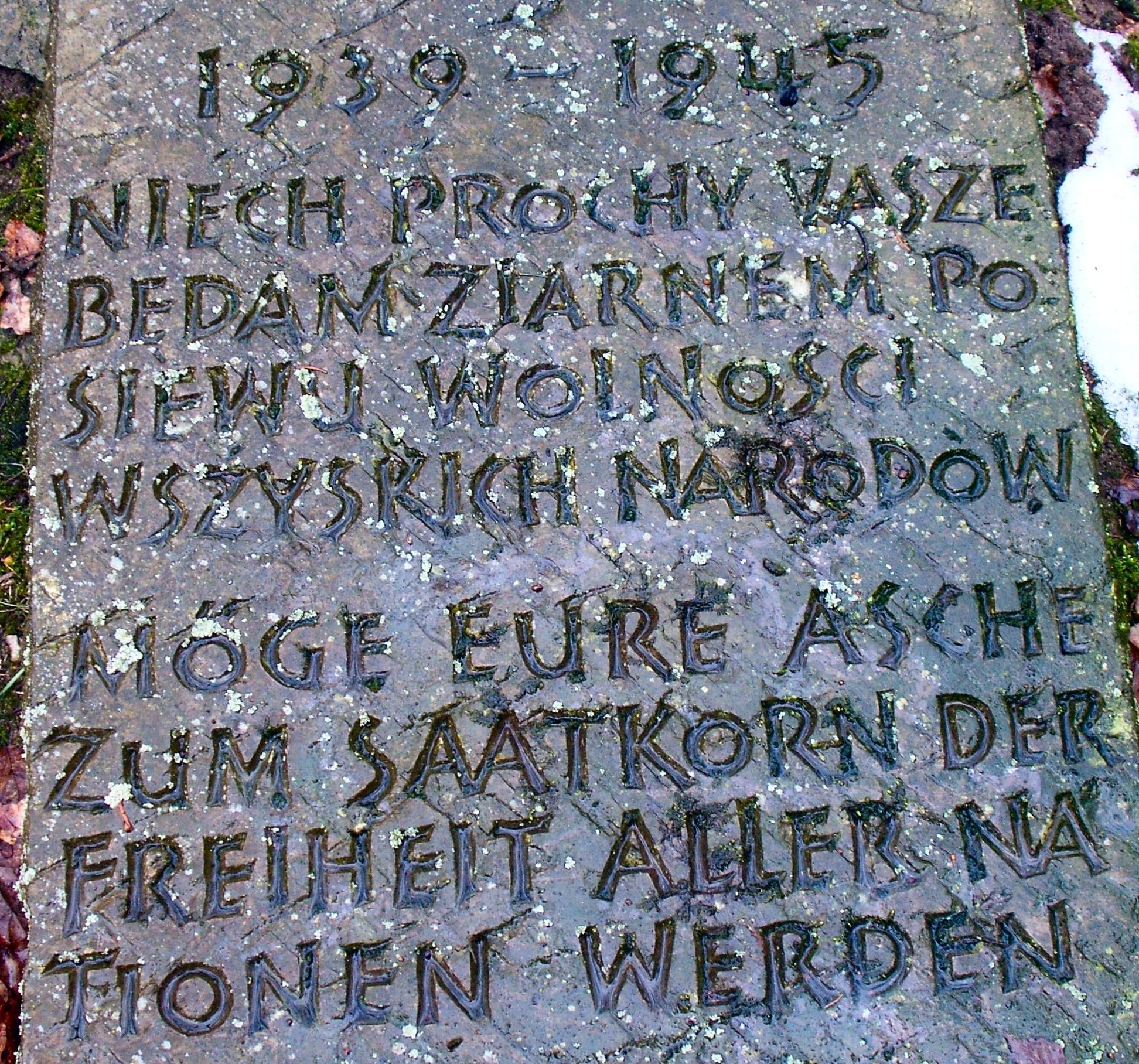 Stone monument with Polish and German text