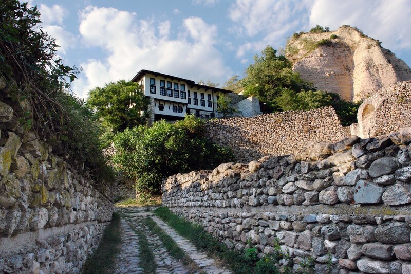Stone path to traditional house