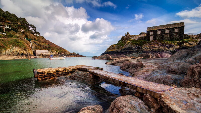 Stone Pier at Coastal Inlet — Blue
