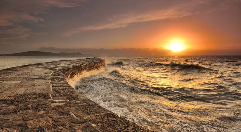 Stone Pier at Sunset — Orange, Dramatic