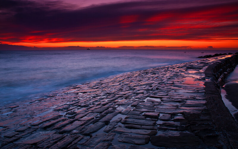 Stone Pier at Sunset — Red