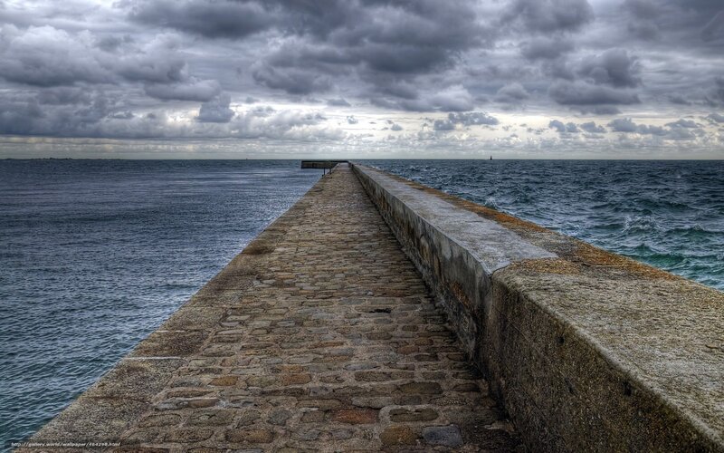 Stone Pier Extending into Sea — Gray, Dramatic, Photograph
