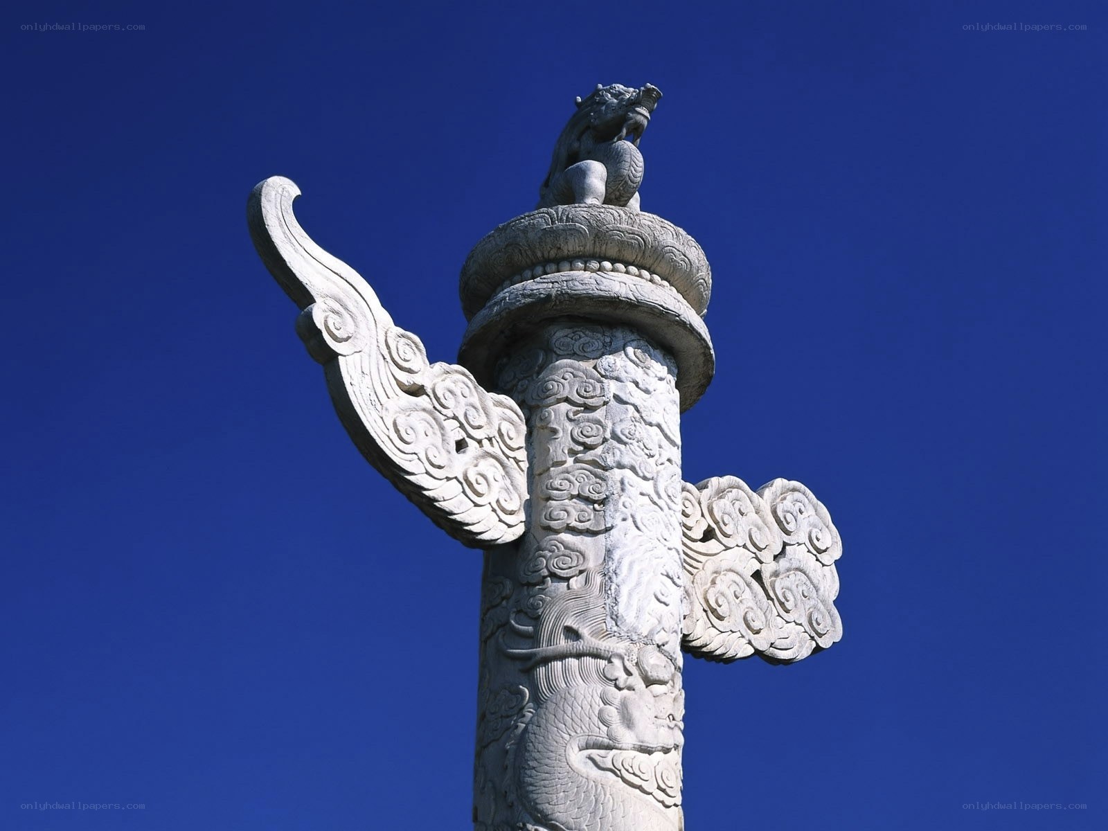 Stone pillar with dragon sculpture