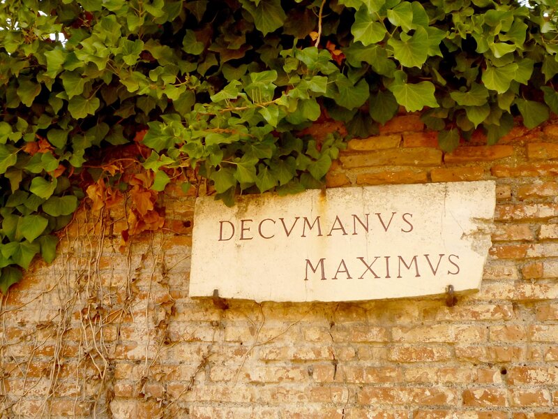 Stone Plaque on Brick Wall