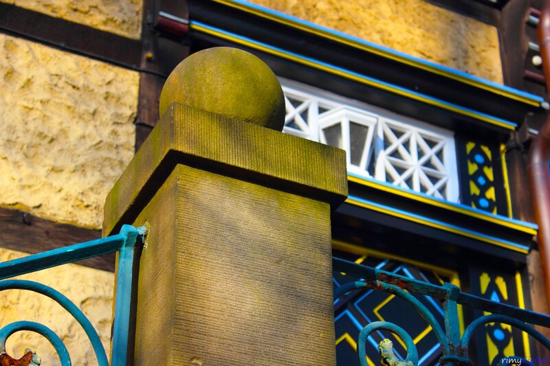 stone post with decorative railing