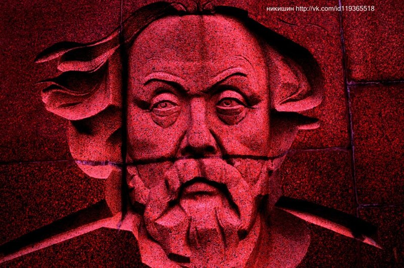 stone relief of a man's face