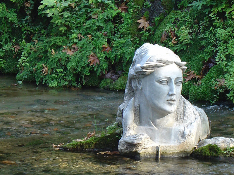 stone sculpture in a stream