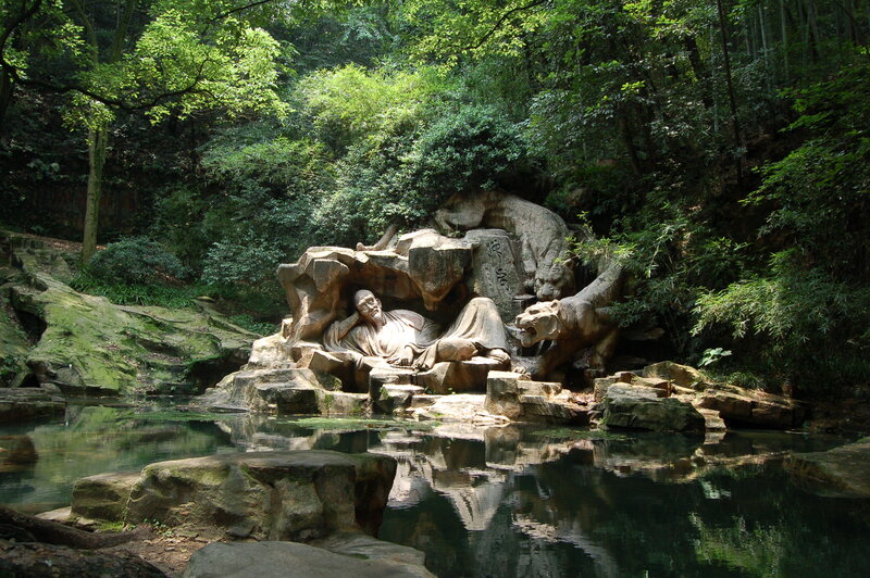 Stone sculpture in forested area