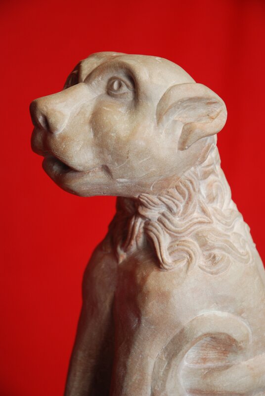 stone sculpture of a dog
